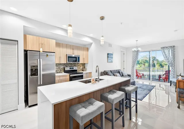 Listing Photo 1 - Condo for sale in building located at 15901 Royal Pointe Ln, Fort Myers, FL 33908 - Unit #202