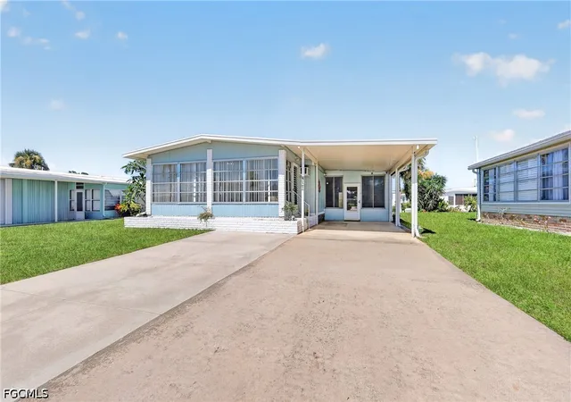 Photo 2 of Manufactured home for sale at 557 Peace Lake Ct, North Fort Myers, FL 33917 | MLS# 2026033844 | Listing updated on 2026-08-17