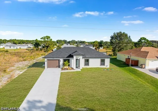 Photo 2 of Sale Pending at 556 Woodview Dr, Lehigh Acres, FL 33972 | MLS# 226028946 | Listing updated on 2026-08-21