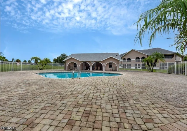 Photo 3 of Townhouse for sale at 28 Cosmopolitan Dr #16, Lehigh Acres, FL 33936 | MLS# 2026034002 | Listing updated on 2026-08-12