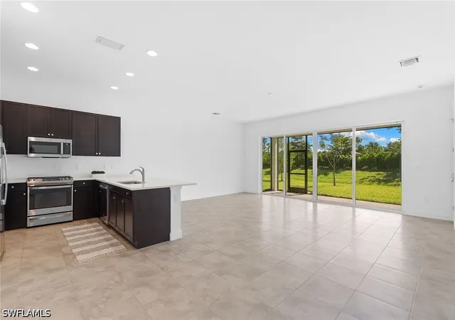Photo 2 of Single family home for sale at 12445 Dahlia Ct, Naples, FL 34120 | MLS# 226029203 | Listing updated on 2026-08-13