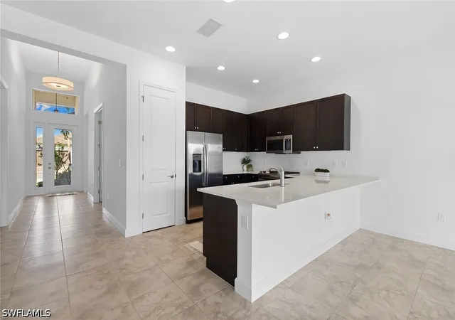 Photo 3 of Single family home for sale at 12445 Dahlia Ct, Naples, FL 34120 | MLS# 226029203 | Listing updated on 2026-08-13