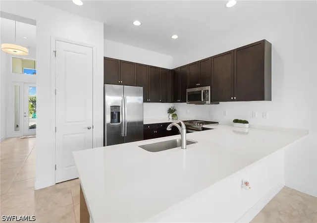 Photo 4 of Single family home for sale at 12445 Dahlia Ct, Naples, FL 34120 | MLS# 226029203 | Listing updated on 2026-08-13