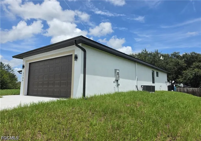 Photo 3 of Single family home for sale at 2106 W 17th Street, Lehigh Acres, FL 33972 | MLS# 2026034257 | Listing updated on 2026-08-18