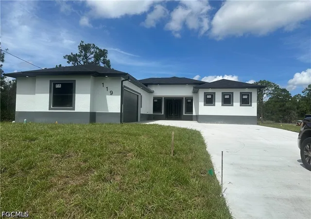 Photo 1 of Single family home for sale at 119 Moore Ave, Lehigh Acres, FL 33936 | MLS# 2026034568 | Listing updated on 2026-08-22