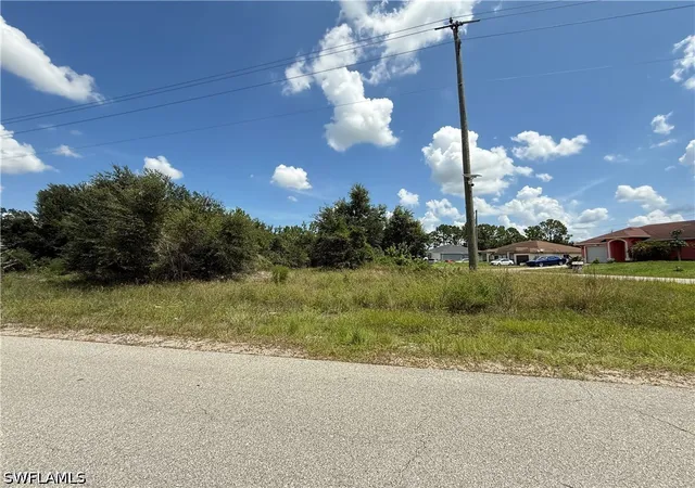 1st image of 1107 Meadow Rd, Lehigh Acres, FL 33973 | MLS# 226029532