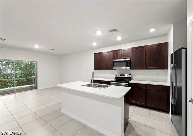 Photo 3 of Townhouse for sale at 15381 Wildflower Cir, Naples, FL 34119 | MLS# 226029753 | Listing updated on 2026-08-19