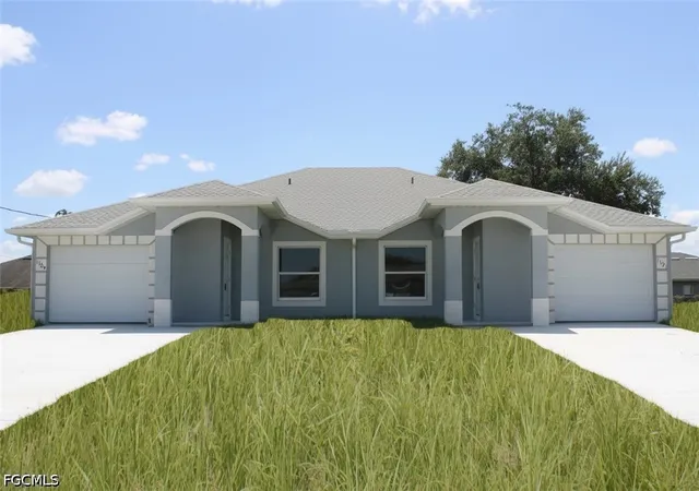 1st image of 1129/1131 Homer Ave S, Lehigh Acres, FL 33973 | MLS# 2026035235