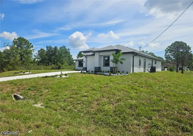 Photo 1 of Single family home for sale at 1102 Poinsettia Ave, Lehigh Acres, FL 33972 | MLS# 2026035464 | Listing updated on 2026-08-25