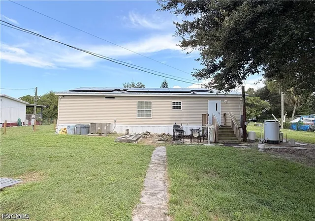 Photo 3 of Manufactured home for sale at 8240 Penny Dr, North Fort Myers, FL 33917 | MLS# 2026035534 | Listing updated on 2026-08-25