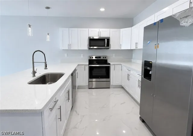 Photo 2 of Multi family home for sale at 2405/2407 Xelda Ave N, Lehigh Acres, FL 33971 | MLS# 226029367 | Listing updated on 2026-08-21