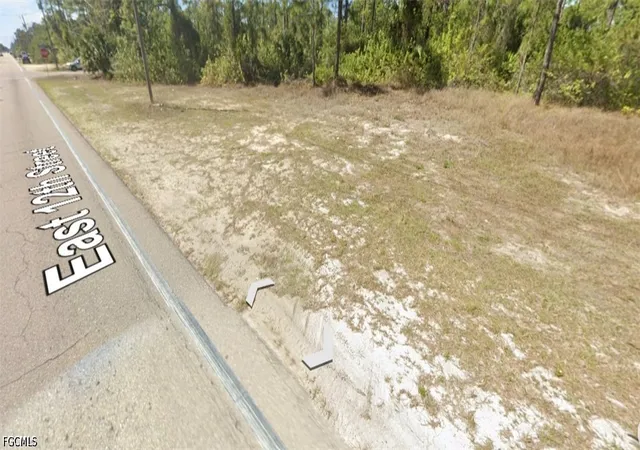 Photo 1 of Land for sale at 410 E 12th St, Lehigh Acres, FL 33972 | MLS# 2026035648 | Listing updated on 2026-08-21