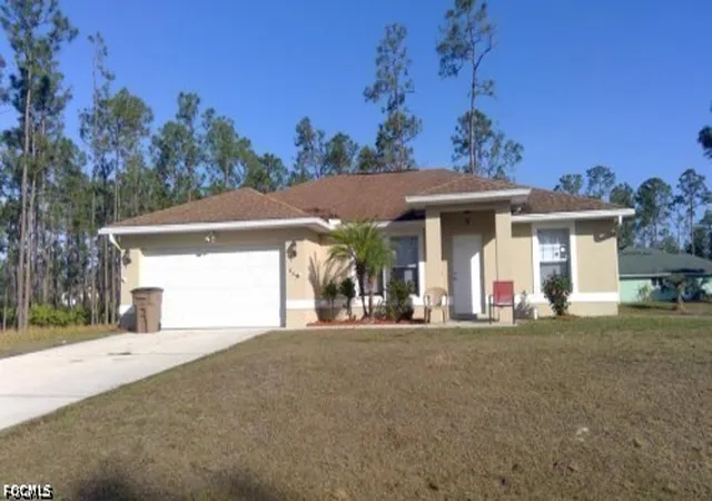 Photo 1 of Single family home for sale at 805 E 13th St, Lehigh Acres, FL 33972 | MLS# 2026035712 | Listing updated on 2026-08-23