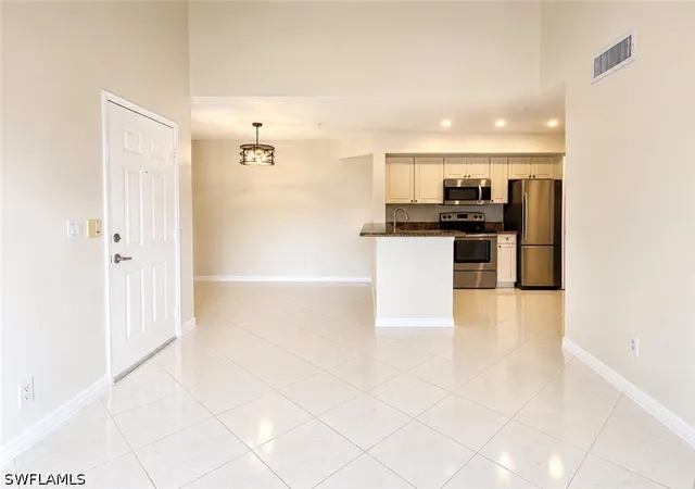 Listing Photo 4 - Condo for sale in building located at 1265 Wildwood Lakes Blvd, Naples, FL 34104 - Unit #201