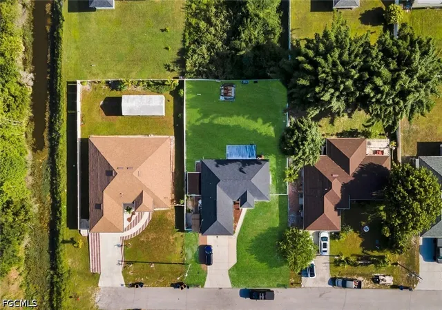 33rd image of 3203 36th St Sw, Lehigh Acres, FL 33976 | MLS# 2026035872