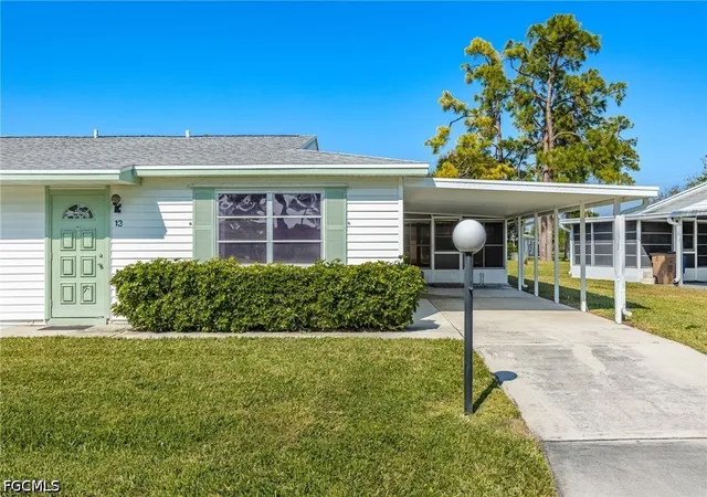 1st image of 13 Pinewood Blvd, Lehigh Acres, FL 33936 | MLS# 2026035987