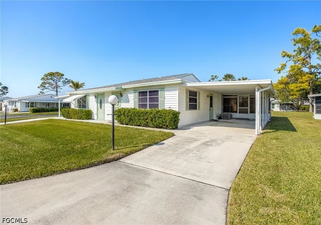 Photo 3 of Townhouse for sale at 13 Pinewood Blvd, Lehigh Acres, FL 33936 | MLS# 2026035987 | Listing updated on 2026-08-25