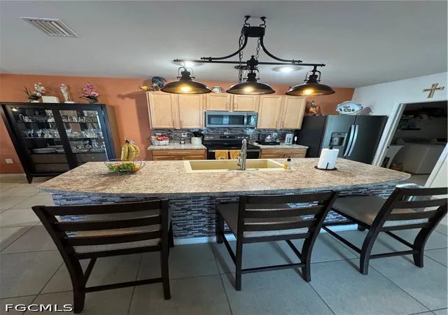 Photo 3 of Townhouse for sale at 10873 Marble Brook Blvd, Lehigh Acres, FL 33936 | MLS# 2026036063 | Listing updated on 2026-08-26