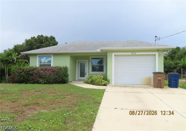 Photo 1 of Single family home for sale at 2713 7th St W, Lehigh Acres, FL 33971 | MLS# 2026036438 | Listing updated on 2026-08-27