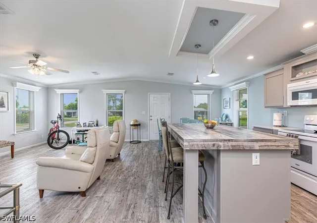 Photo 4 of Manufactured home for sale at 585 Cape Florida Ln, Naples, FL 34104 | MLS# 226031238 | Listing updated on 2026-08-30