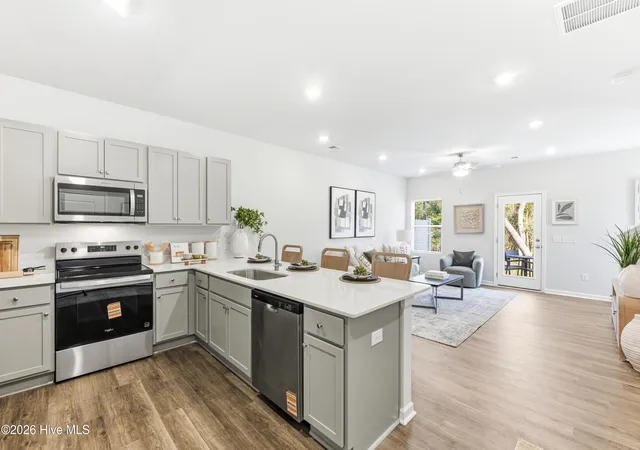 Photo 1 of Townhouse for sale at 607 Sandy Holw Dr, Jacksonville, NC 28540 | MLS# 100590052 | Listing updated on 2026-09-14