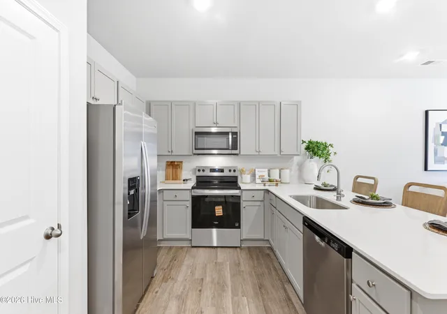 Photo 2 of Townhouse for sale at 607 Sandy Holw Dr, Jacksonville, NC 28540 | MLS# 100590052 | Listing updated on 2026-09-14