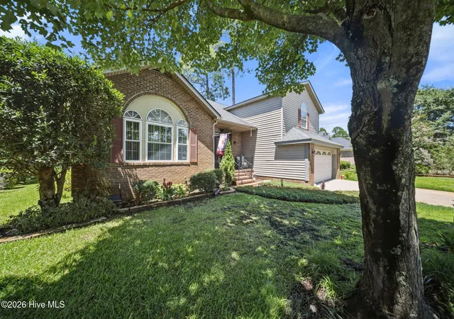 Photo 1 of Single family home for sale at 7017 Brittany Lakes Dr, Wilmington, NC 28411 | MLS# 100594680 | Listing updated on 2026-08-26