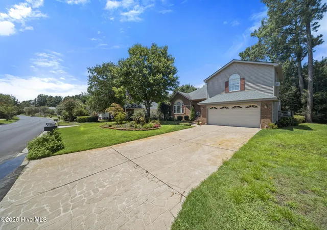 Photo 2 of Single family home for sale at 7017 Brittany Lakes Dr, Wilmington, NC 28411 | MLS# 100594680 | Listing updated on 2026-08-26