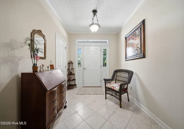 Photo 4 of Single family home for sale at 7017 Brittany Lakes Dr, Wilmington, NC 28411 | MLS# 100594680 | Listing updated on 2026-08-26