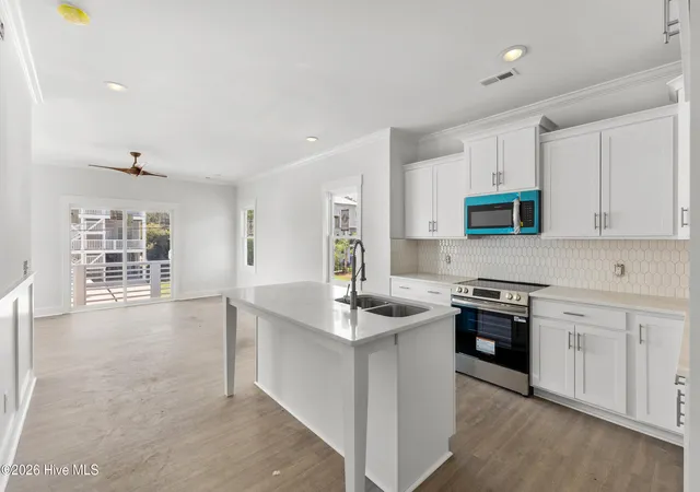 Photo 3 of Townhouse for sale at 314 Spartanburg Ave #Unit 1, Carolina Beach, NC 28428 | MLS# 100593429 | Listing updated on 2026-09-09
