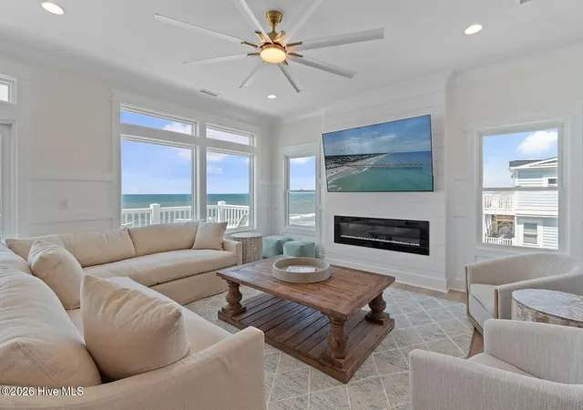 Photo 2 of Single family home for sale at 923 E Beach Dr, Oak Island, NC 28465 | MLS# 100590957 | Listing updated on 2026-09-14