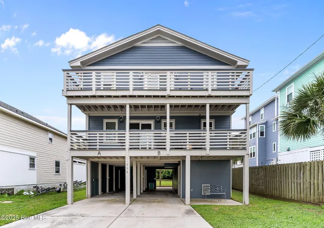 Photo 1 of Single family home for sale at 1504 Canal Dr, Carolina Beach, NC 28428 | MLS# 100590471 | Listing updated on 2026-08-19