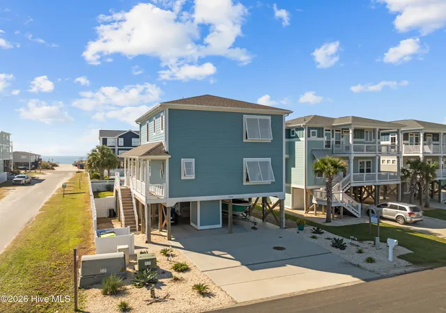 Photo 2 of Single family home for sale at 4929 E Pelican Dr, Oak Island, NC 28465 | MLS# 100599146 | Listing updated on 2026-09-02
