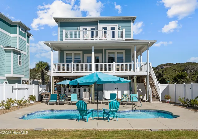 Photo 4 of Single family home for sale at 4929 E Pelican Dr, Oak Island, NC 28465 | MLS# 100599146 | Listing updated on 2026-09-02