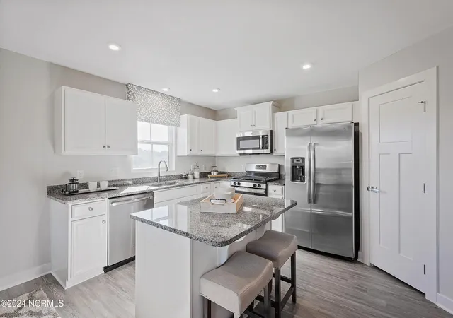 Photo 3 of Single family home for sale at 123 Tuscorora Ln, Moyock, NC 27958 | MLS# 100596725 | Listing updated on 2026-10-27