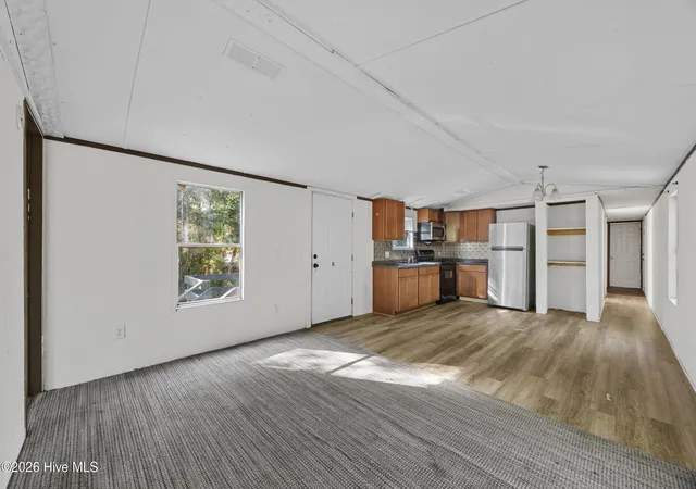 Photo 2 of Manufactured home for sale at 281 Holly Dr, Southport, NC 28461 | MLS# 100598305 | Listing updated on 2026-08-22