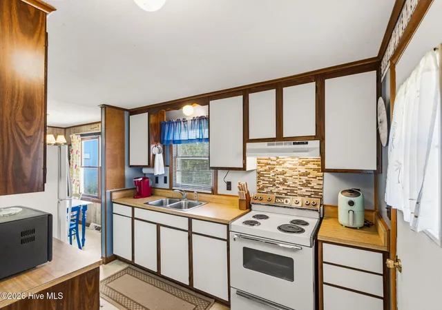 Photo 3 of Single family home for sale at 1488 Colington Rd, Kill Devil Hills, NC 27948 | MLS# 100592965 | Listing updated on 2026-09-11