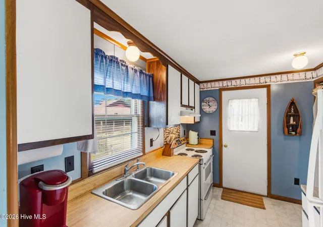 Photo 4 of Single family home for sale at 1488 Colington Rd, Kill Devil Hills, NC 27948 | MLS# 100592965 | Listing updated on 2026-09-11