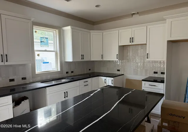 Photo 4 of Single family home for sale at 254 NE 66th Street, Oak Island, NC 28465 | MLS# 100594361 | Listing updated on 2026-08-24