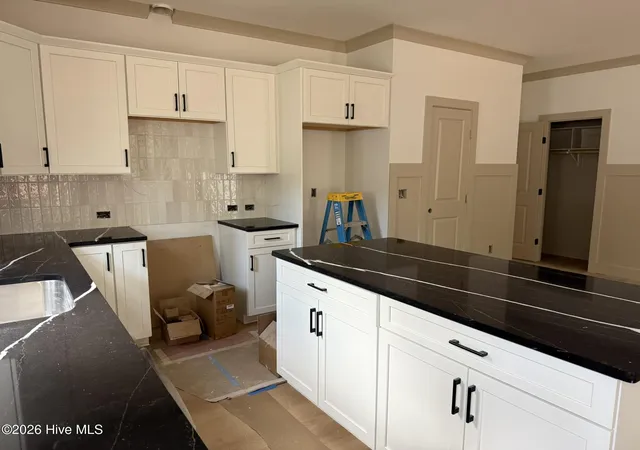 Photo 5 of Single family home for sale at 254 NE 66th Street, Oak Island, NC 28465 | MLS# 100594361 | Listing updated on 2026-08-24