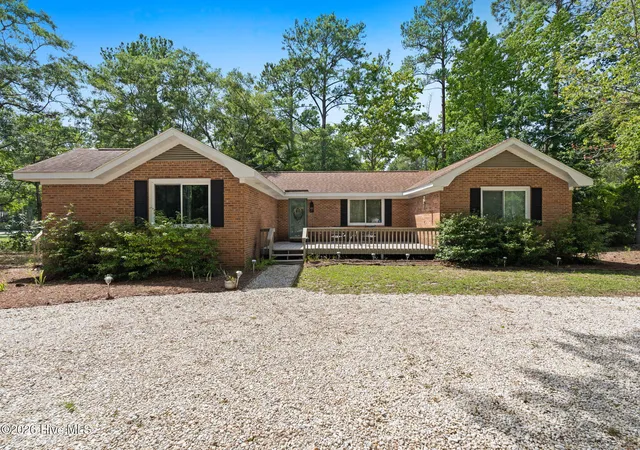 Photo 1 of Single family home for sale at 1 Golfview Ct, Carolina Shores, NC 28467 | MLS# 100590908 | Listing updated on 2026-09-06