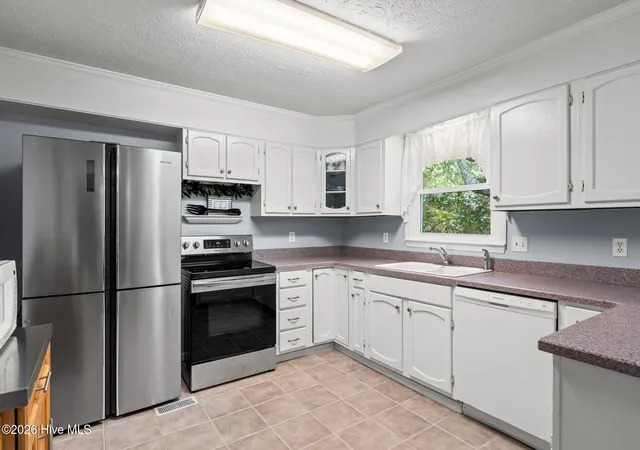 Photo 4 of Single family home for sale at 1 Golfview Ct, Carolina Shores, NC 28467 | MLS# 100590908 | Listing updated on 2026-09-06