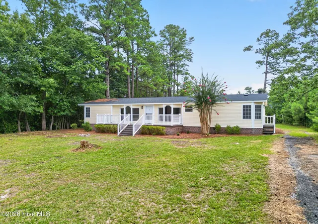 Photo 2 of Manufactured home for sale at 1209 Hickman Rd Nw, Calabash, NC 28467 | MLS# 100590764 | Listing updated on 2026-08-25