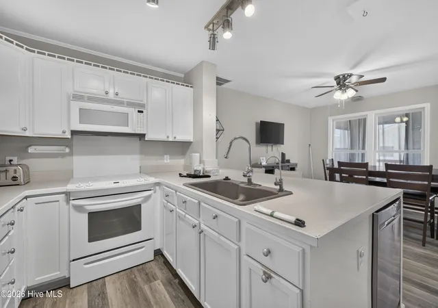 Photo 3 of Townhouse for sale at 329 S 5th Avenue #B, Kure Beach, NC 28449 | MLS# 100589829 | Listing updated on 2026-08-19