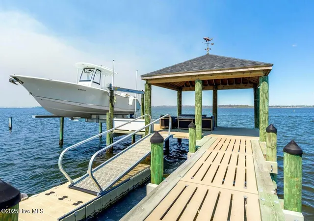 Photo 3 of Single family home for sale at 7012 Sound Dr, Emerald Isle, NC 28594 | MLS# 100594157 | Listing updated on 2026-09-19