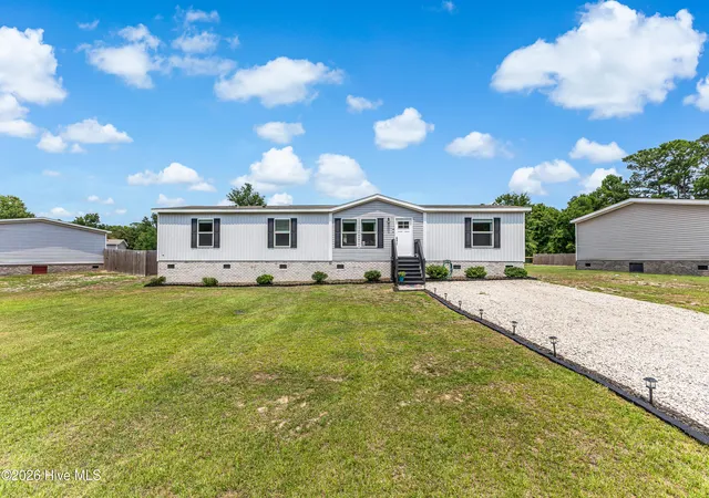 Photo 1 of Manufactured home for sale at 2097 Fay Cir Sw, Supply, NC 28462 | MLS# 100597704 | Listing updated on 2026-09-11