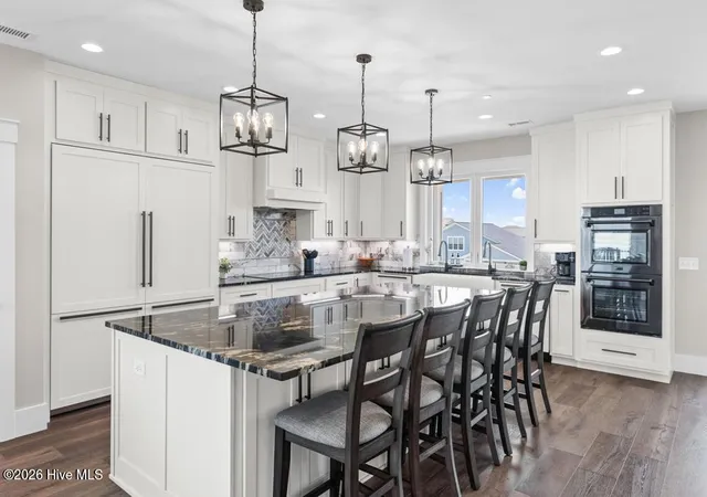 Photo 3 of Single family home for sale at 6620 Kings Lynn Dr, Oak Island, NC 28465 | MLS# 100598262 | Listing updated on 2026-09-29