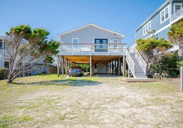 Photo 1 of Single family home for sale at 3016 W Beach Dr, Oak Island, NC 28465 | MLS# 100561729 | Listing updated on 2026-08-18