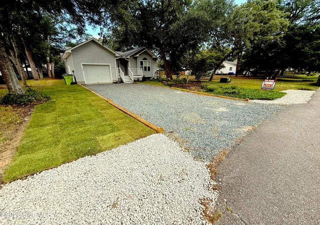Photo 33 of Single family home for sale at 124 Nw 8th Street, Oak Island, NC 28465 | MLS# 100591343 | Listing updated on 2026-09-02