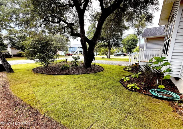 Photo 3 of Single family home for sale at 124 NW 8th Street, Oak Island, NC 28465 | MLS# 100591343 | Listing updated on 2026-09-02